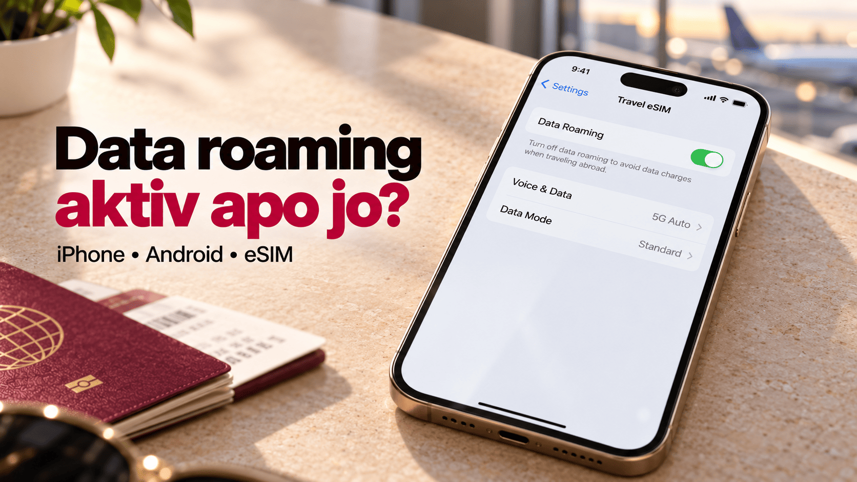 iPhone mbi tavolinë me data roaming të aktivizuar për eSIM-in e udhëtimit.